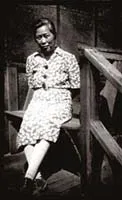 Shigeyo Yamamoto on the doorstep of the barracks