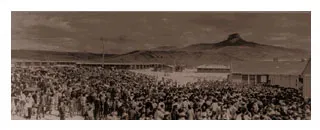 Panoramic view of internees arriving at camp Panoramic view of internees arriving at camp